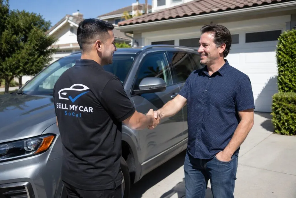Sell My Car SoCal representative working with an SUV seller interested in receiving a fast cash offer for their vehicle.